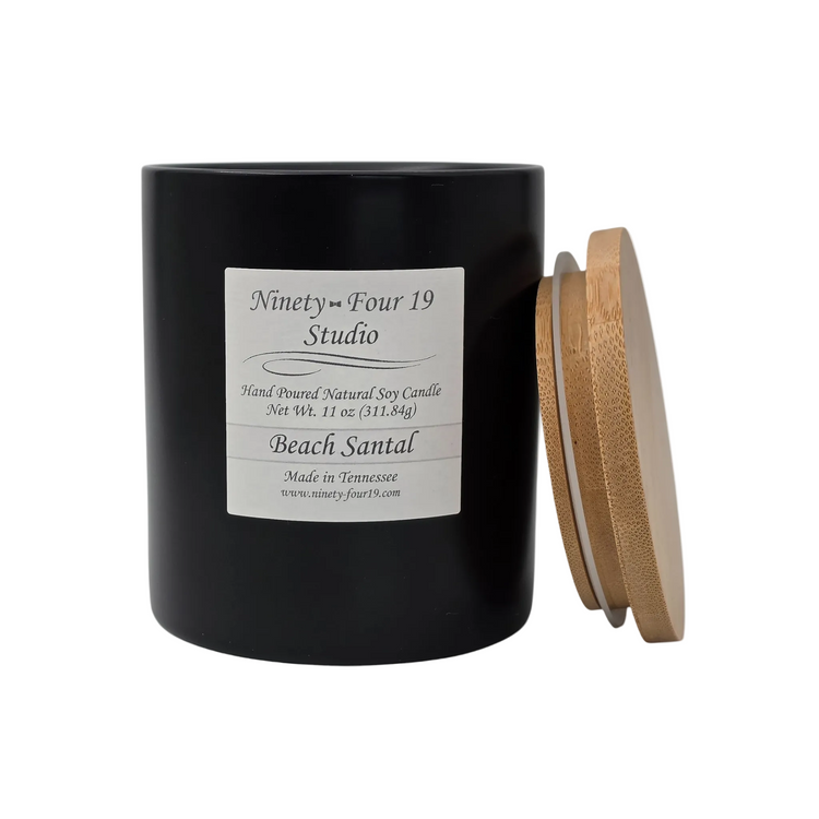 natural soy wax candle in a black ceramic container