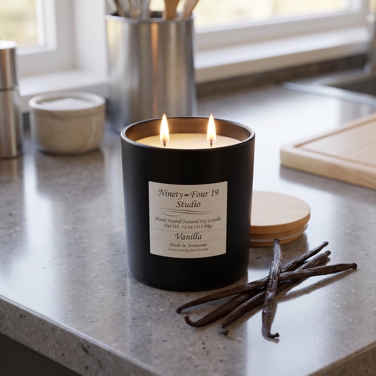 scented natural soy wax candle in a black ceramic container