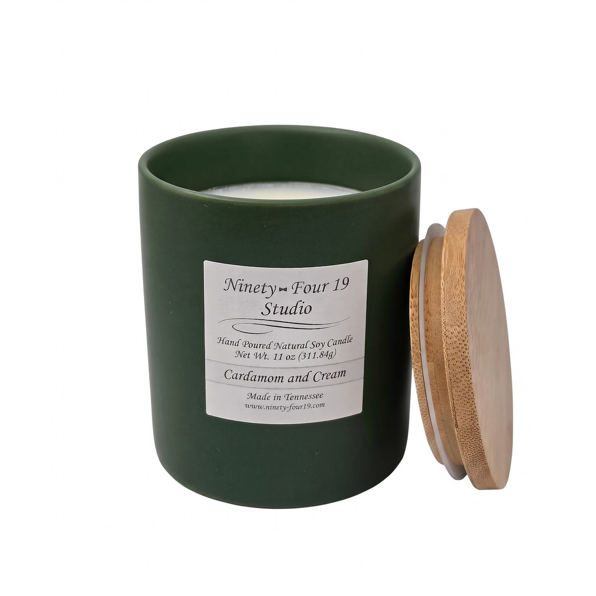 scented natural soy wax candle in a evergreen ceramic container