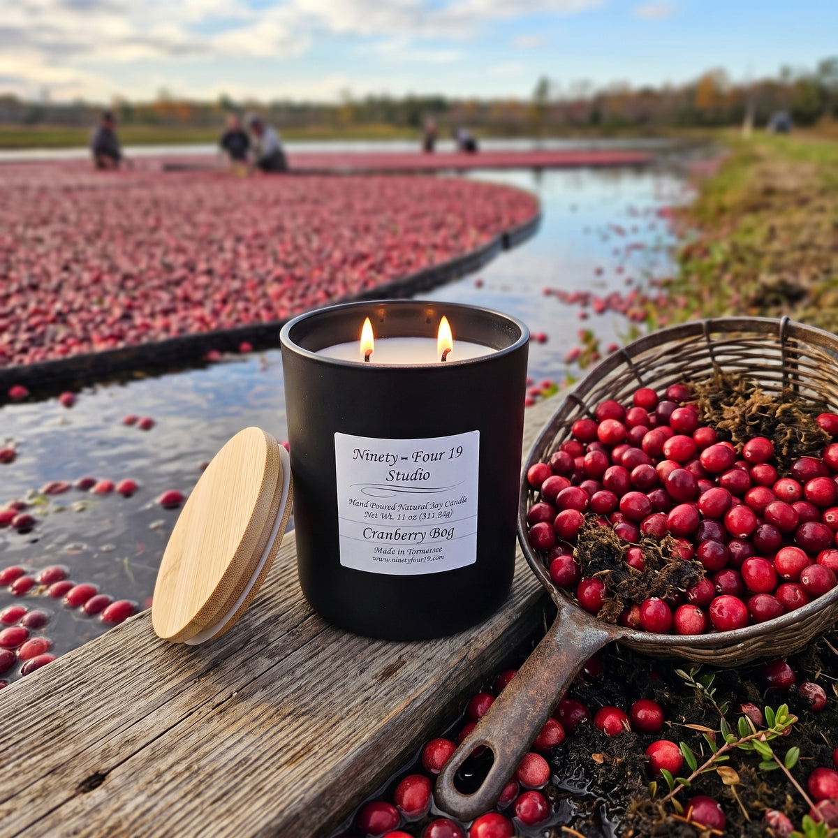 scented natural soy wax candle in a black ceramic container