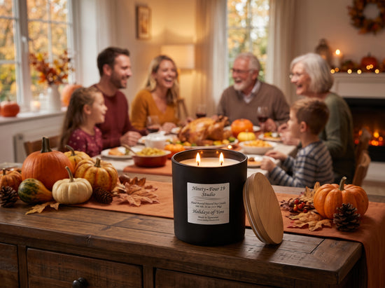 natural soy wax candle in a black ceramic container