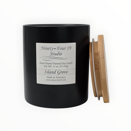 Natural soy wax candle in a black ceramic container
