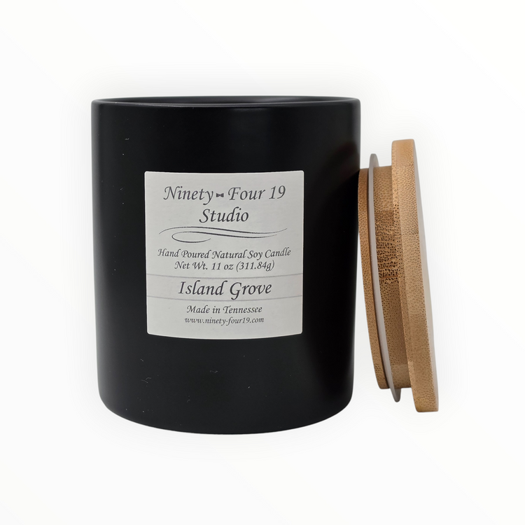 Natural soy wax candle in a black ceramic container