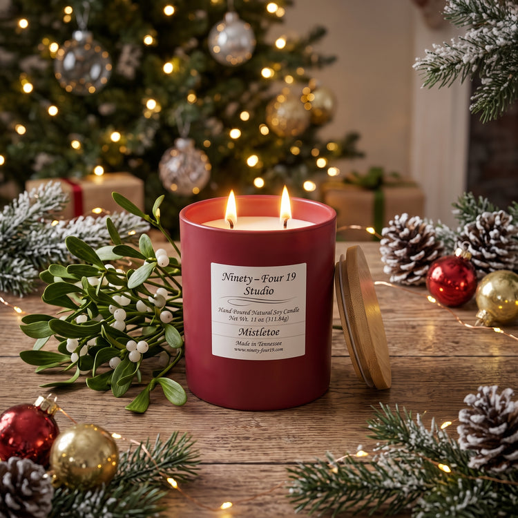 scented natural soy wax candle in a ruby ceramic container