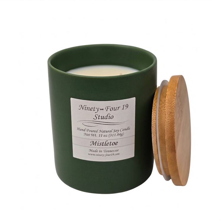 scented natural soy wax candle in a evergreen ceramic container