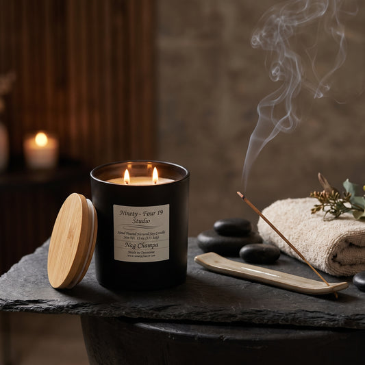 natural soy wax candle in a black ceramic container