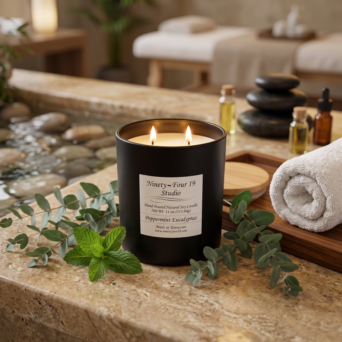 scented natural soy wax candle in a black ceramic container