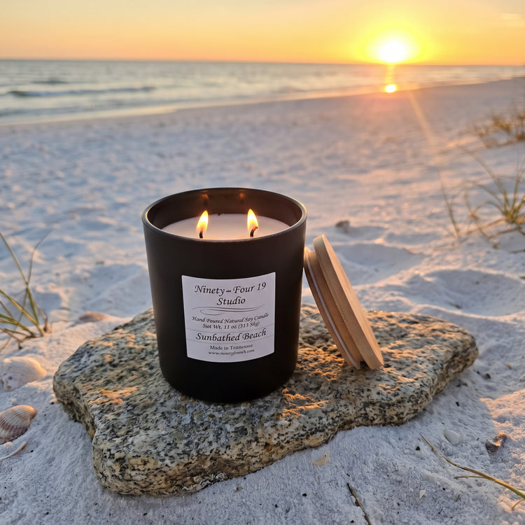 natural soy wax candle in a black ceramic container