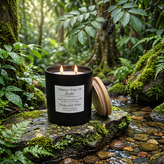 scented natural soy wax candle in a black ceramic container